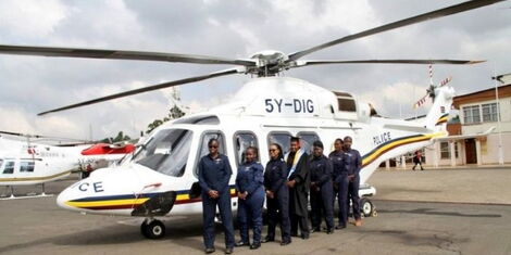 Eunice Dobby with colleagues after graduating at Wilson airport