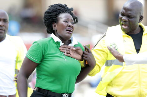 Winnie Nyar Kasagam was running with a brick at hand during a Gor Mahia game on February 13, 2022.