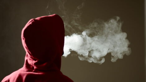 A young person smoking