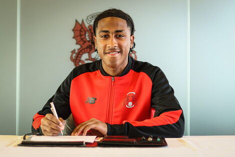 Zech Obiero Signing his professional senior contract with Leyton Orient on Friday February 4, 2022