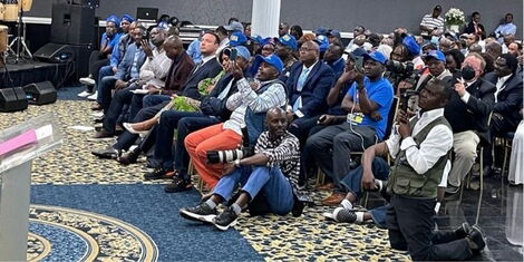 _Felix Masi (seated) attending Raila Odinga's address in Washington DC on Monday, April 25, 2022..jpg