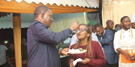 National Assembly Speaker Justin Muturi feeds a guest cake during his surprise birthday party on May 6, 2022..jpg (