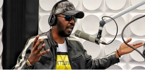 Kiss FM radio presenter Andrew Kibe in studio