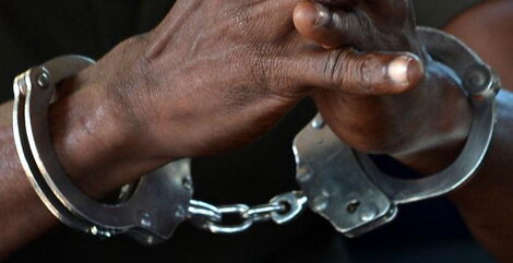 A suspect in handcuffs