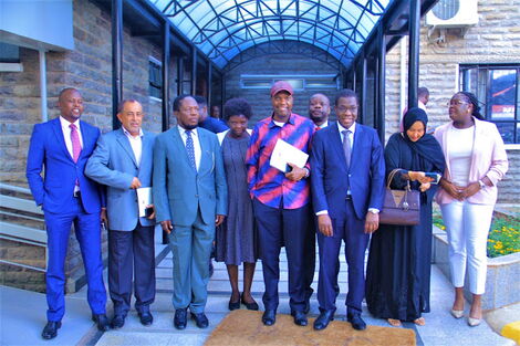 Azimio members led by minority leader Opiyo Wandayi pose for a photo after being cleared to vie for EALA on November 9, 2022 