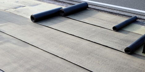 A roof with bitumen fittings.