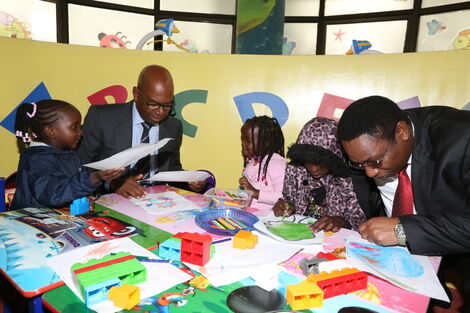 undated image of the Late Bob Collymore spending time with children 