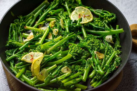 cooked tender stem broccoli on a pan ready to serve