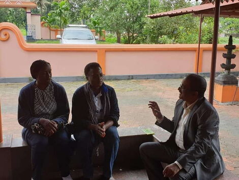 Raila Odinga’s well-wisher Mr Byragoni Sreenivas Goud (right) speaks with Rosemary Odinga (left) in India