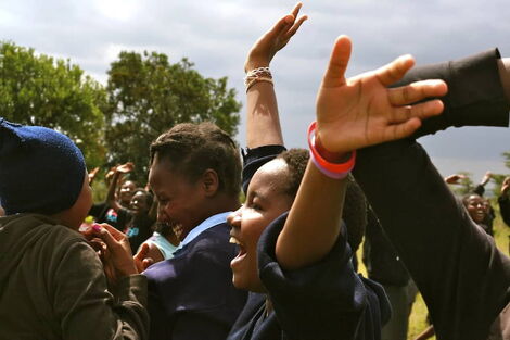 Kenyan students celebrate KCSE results in the past