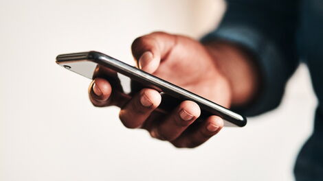 A person using a telephone