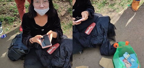 The Chinese lady was receiving both cash and mobile money, claiming that she was bankrupt. 
