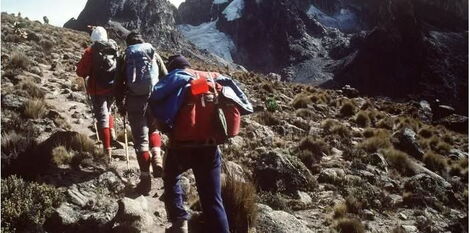 Hikers climbing up Mt Kenya