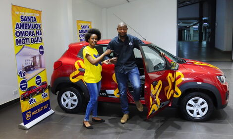 Zadock Sanawa being handed his new car keys on December 2, 2021.