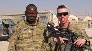An undated image of pastor George Okoth(left) and a US soldier 