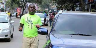 An image of Dennis Wachira hawking in the streets of Nairobi in 2018.
