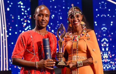 Kenyan nurse Anna Qabale Duba cebebrate after winning the first ever Aster Guardian Global Nursing award with her husband Halkano Hargura.