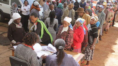 The elderly queuing for cash payments under the social protection programme.