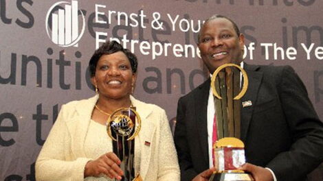 Business mogul James Mwangi and his wife, Jane, pose with the 2012 Ernst & Young World Entrepreneur of the Year Award