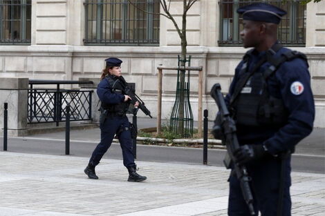 File image of French Police officers on patrol in Paris.