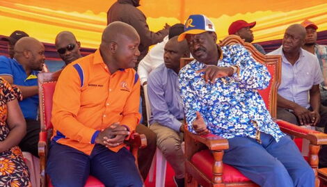 Kakamega Givernor-elect Fernandes Barasa and his ODM party boss Raila Odinga during a public rally on August 26, 2022