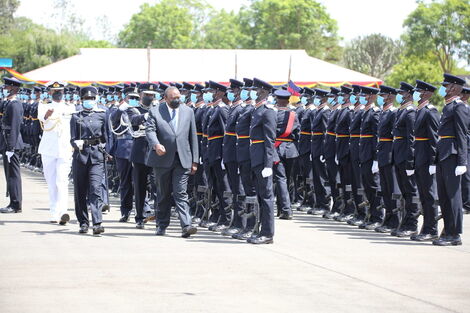Inspector Sharon Ijeloit Oramisi Commanding final parade alongside President Uhuru Kenyatta at Kiganjo college on Wednesday January 19, 2022 
