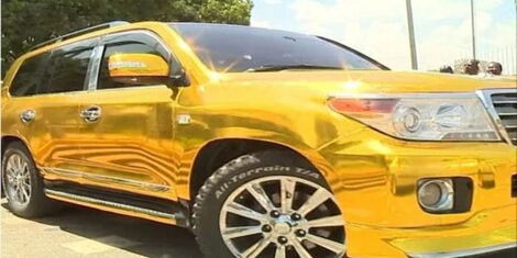 A photo of a car with golden wrappers.