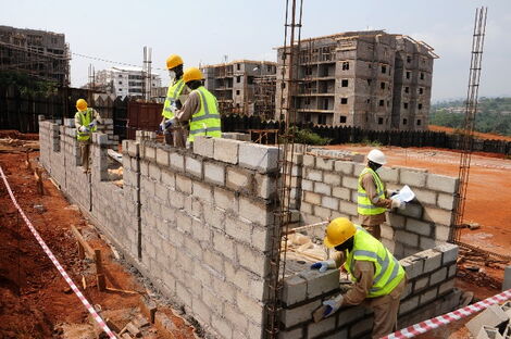 Workers at a building under construction