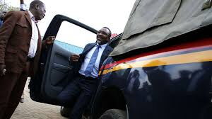 An Undated Photo of Pastor Ng'ang'a alighting from a police vehicle 