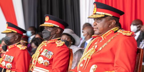 President Uhuru Kenyatta (left) alongside KDF Chief of Defence of Forces General Robert Kibochi( far left) at the 58th Jamhuri Day Celebrations held at the Uhuru Gardens on Sunday, December 12 2021.