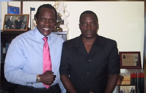 News anchor Jeff Koinage and former Congo President Joseph Kabila in 2006