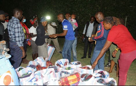 Sportpesa Chief Executive Officer (CEO) Ronald Karauri at Gatuoro Village with the Kasarani Fire Victims on February 28, 2022.