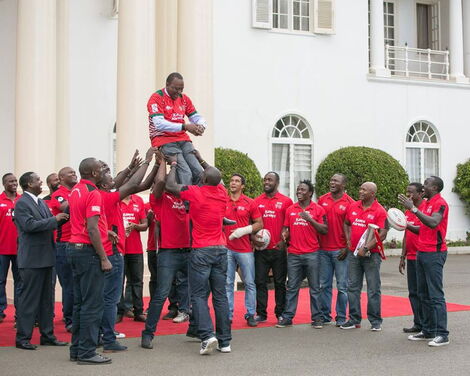 A photo of the Kenya Sevens Rugby Team lifting President Uhuru Kenyatta on Thursday, April 21, 2016.