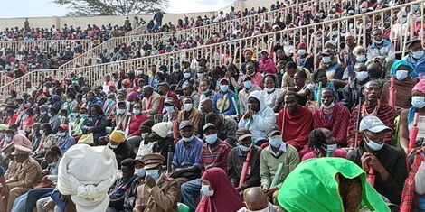 Kenyans follow proceedings at the Nyayo Stadium during Kenya's 59th Jamhuri Day celebrations.