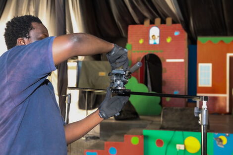 An image of Kenyans.co.ke video producer Kelvin Mwirigi on the set of a past shoot