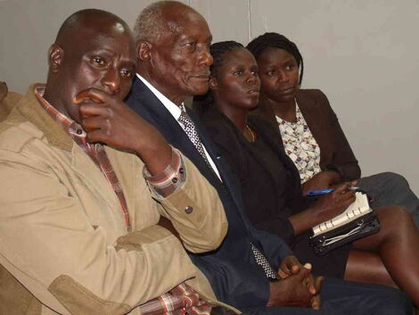 Mzee Jackson Kibor (centre) in court in 2019