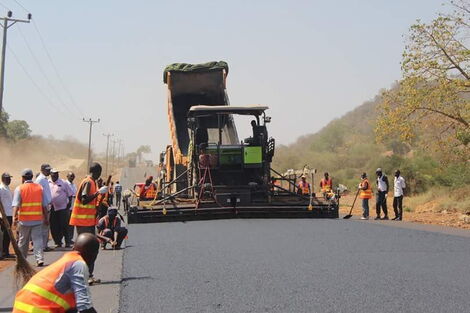 A file image of contractors working on the Kibwezi-Kitui Highway