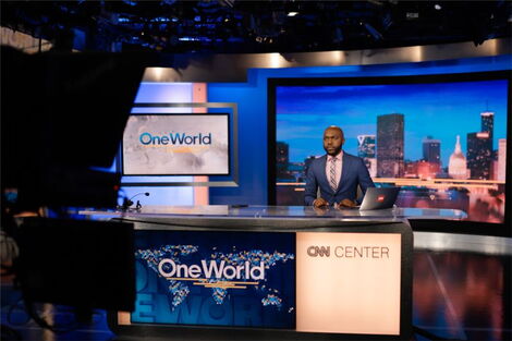 Larry Madowo anchoring news at CNN studios 