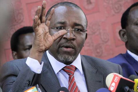 A photo of Meru Senator Mithika Linturi gesturing during a past press address at Parliament Buildings.