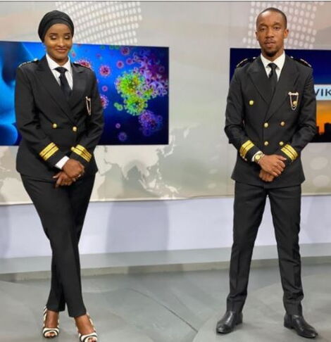 Citizen TV anchors Lulu Hassan and Rashid Abdalla with matching pilots uniforms during a bulletin in June 2020.