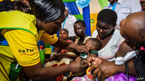 A health worker vaccinating a child against malaria in Ndhiwa, Homabay County on September 13, 2019. Must