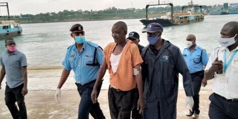Man who wnet overboard the Mv Kwale being escorted by Kenya Ferry staff on July 3, 2020.
