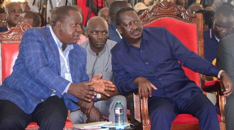 ODM part leader Raila Odinga(Right) with Interior Cabinet Secretary Fred Matiang'i