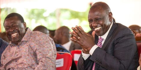 President William Ruto and Prime Cabinet Secretary Musalia Mudavadi share a light moment during a meeting with elected leaders from Western Kenya on December 8, 2022.