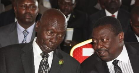 An undated image of Musalia Mudavadi having a talk with the late President Moi at a past event