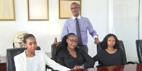 An Image of the Murgor sisters with their lawyer Philip Murgor during a press briefing.