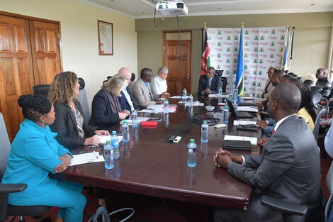 Makueni County employees give a presentation to Bill Gates on agriculture, food security and value chain