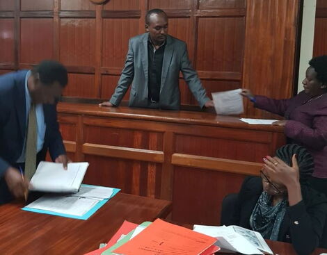Security analyst Mwenda Mbijiwe attending a court case in June 2019