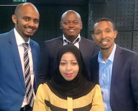 Najma Ismail (front) with colleagues at Standard Group from left Hussein Mohammed, Ali Manzu and Mohammed Ali.