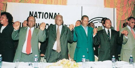 narc_leaders_charity_ngilu_michael_kijana_wamalwa_mwai_kibaki_raila_odinga_kalonzo_musyoka_and_george_saitoti_announce_their_alliance_at_uhuru_park_in_october_2002.
